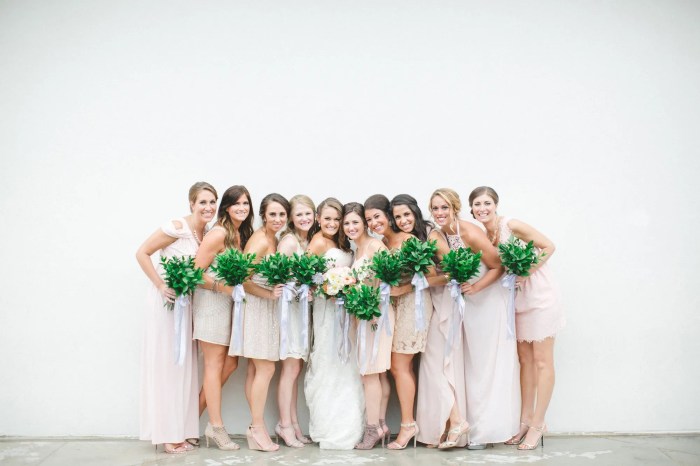 Blush wedding dress with bridesmaids